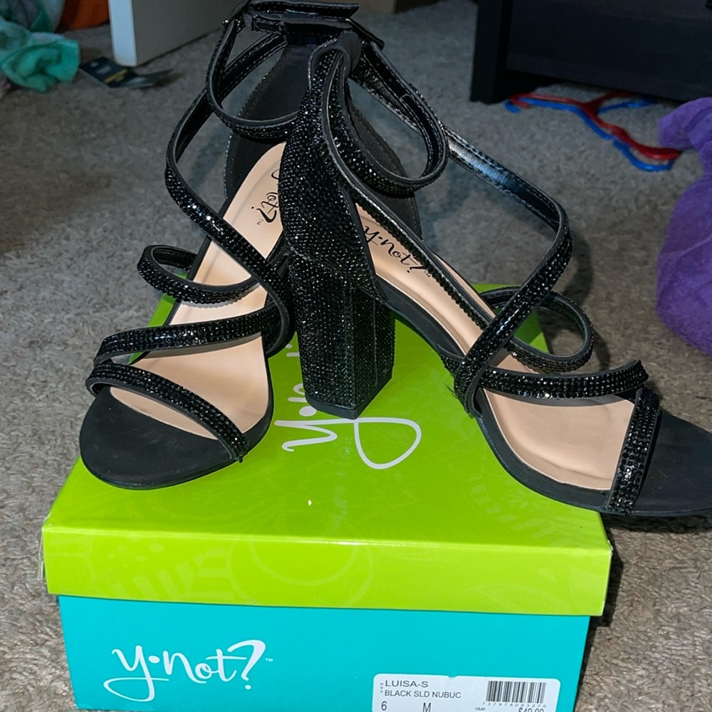 Size 6 black Luisa Spagnoli heels. Worn once. Still in the box